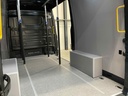 Wielkastbescherming glad uitgevoerd in 15mm lichtgrijs betonplex,  afgewerkt met aluminium hoeklijn